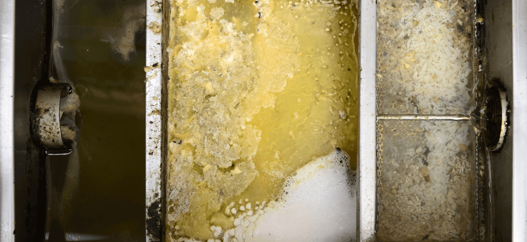 Commercial grease trap pumping service