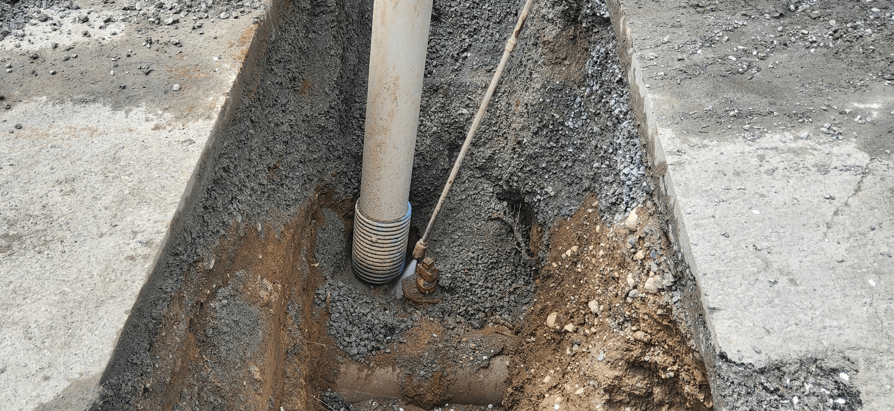 Hydrovac slot trenching for utilities and conduit